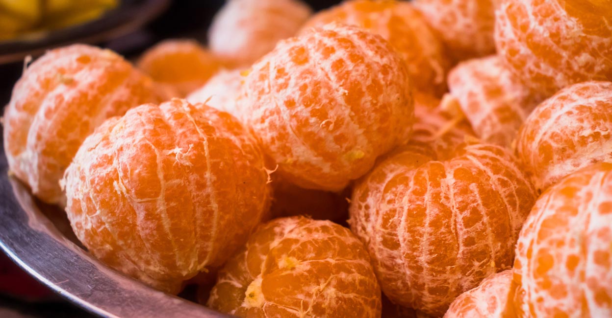 Fresh, ripe, peeled oranges. Photo: iStock/Dimple Bhati