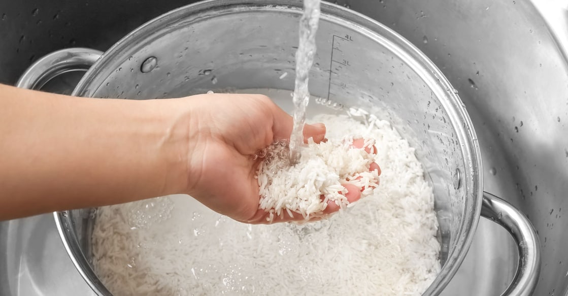 Washing rice Representative image: Shutterstock/PawelKacperek