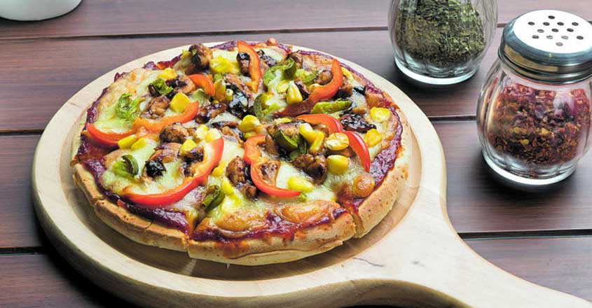 'People in India love cheese, toppings on their pizza'
