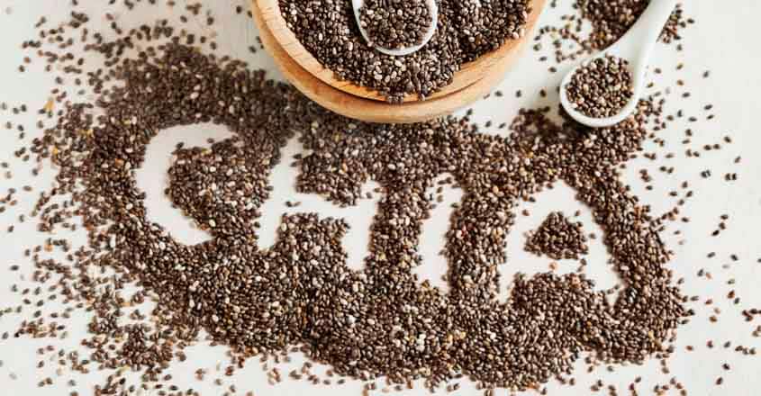 474006038 Chia seeds. Chia word made from chia seeds. Selective focus