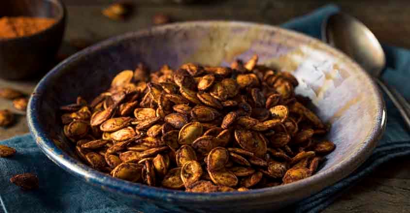 609815126 Homemade Roasted Spicy Pumpkin Seeds with Chili and Paprika