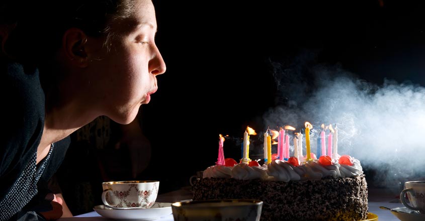 Girl Celebrating His Birthday And Blowing Candles On Cake. Stock Photo,  Picture and Royalty Free Image. Image 85948538.