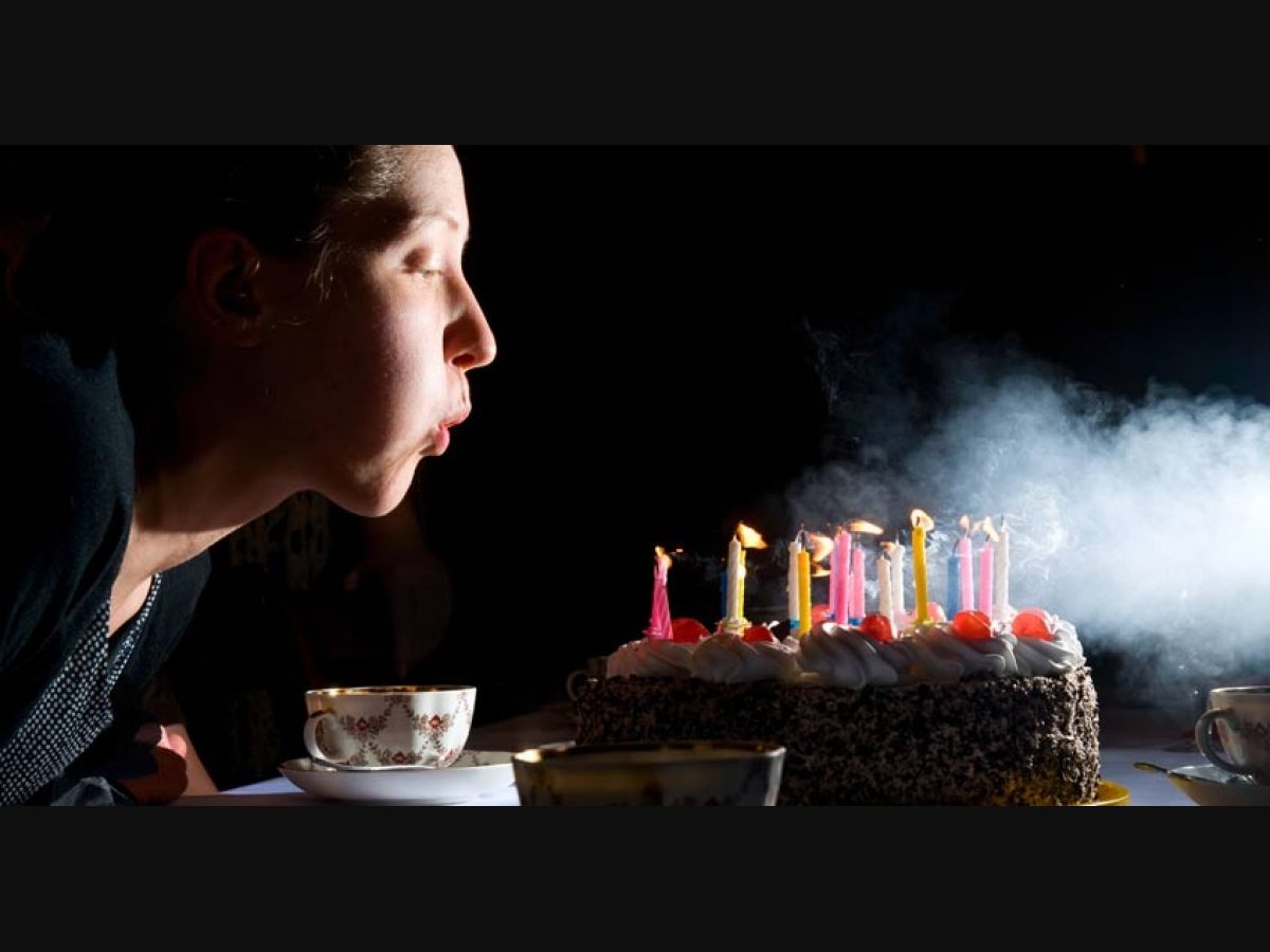 Premium Photo | Cute caucasian boy blowing up candles pn birthday cake