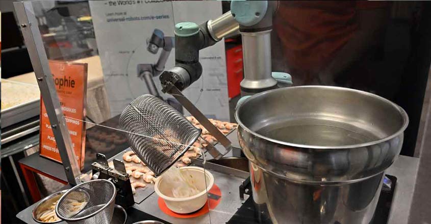 Sophie the robot whips up oodles of Singapore noodles Sophie the robot whips up oodles of Singapore noodles