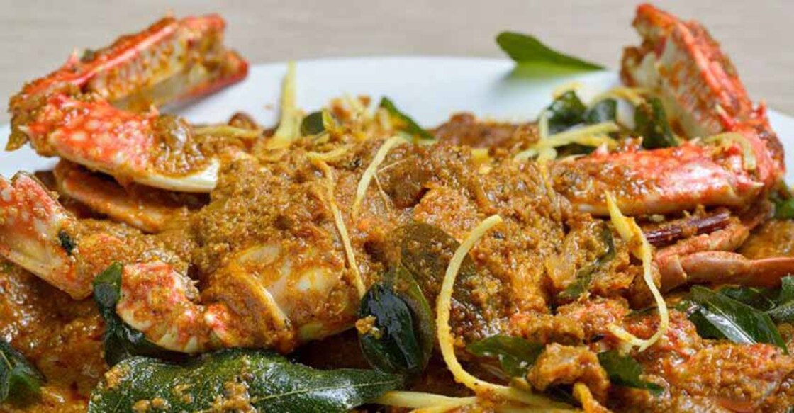Spicy crab on a bed of curry leaves
