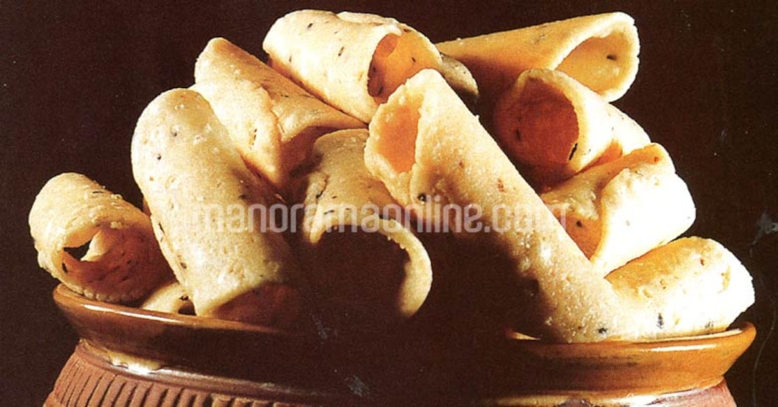 Kuzhalappam Pipe-shaped savoury cookies with a hint of black sesame add a crunch to your teatime!