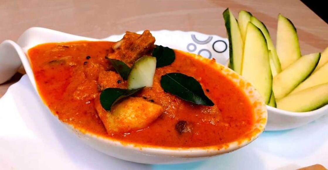 Raw mango chicken curry