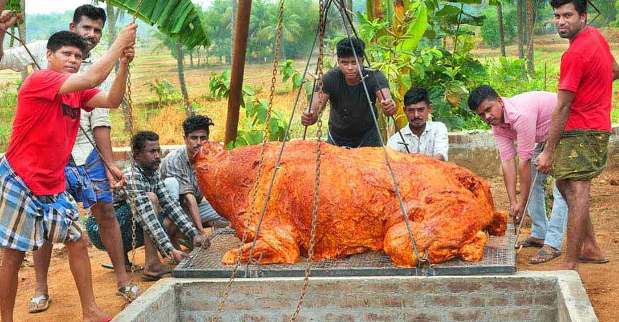 Whole roasting a 300 kg buffalo; Kerala food vlogger takes it to next level