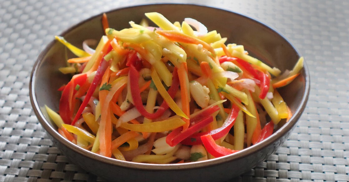 raw-mango-salad Give the raw mango a twist with carrots, capsicum and more, to make a crunchy, healthy salad. Photo: Chef Arun Vijayan