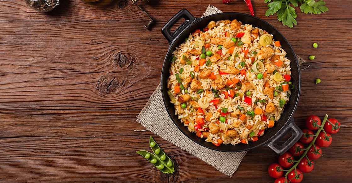 If you are ready to spend a little time in the kitchen, you can prepare a comparatively healthy chicken fried rice at home. Photo: Shutterstock/gkrphoto