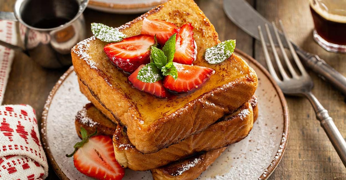 Classic French toast with freshly sliced strawberries. Photo: iStock/VeselovaElena
