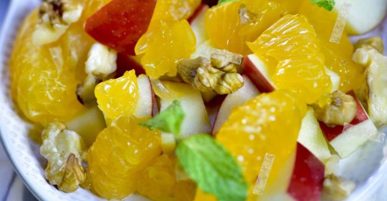apple-walnut-orange-salad.jpg Garnish the apple-walnut-orange salad with mint leaves and drizzle the dressing over it. Photo: Chef Ranveer Brar's website