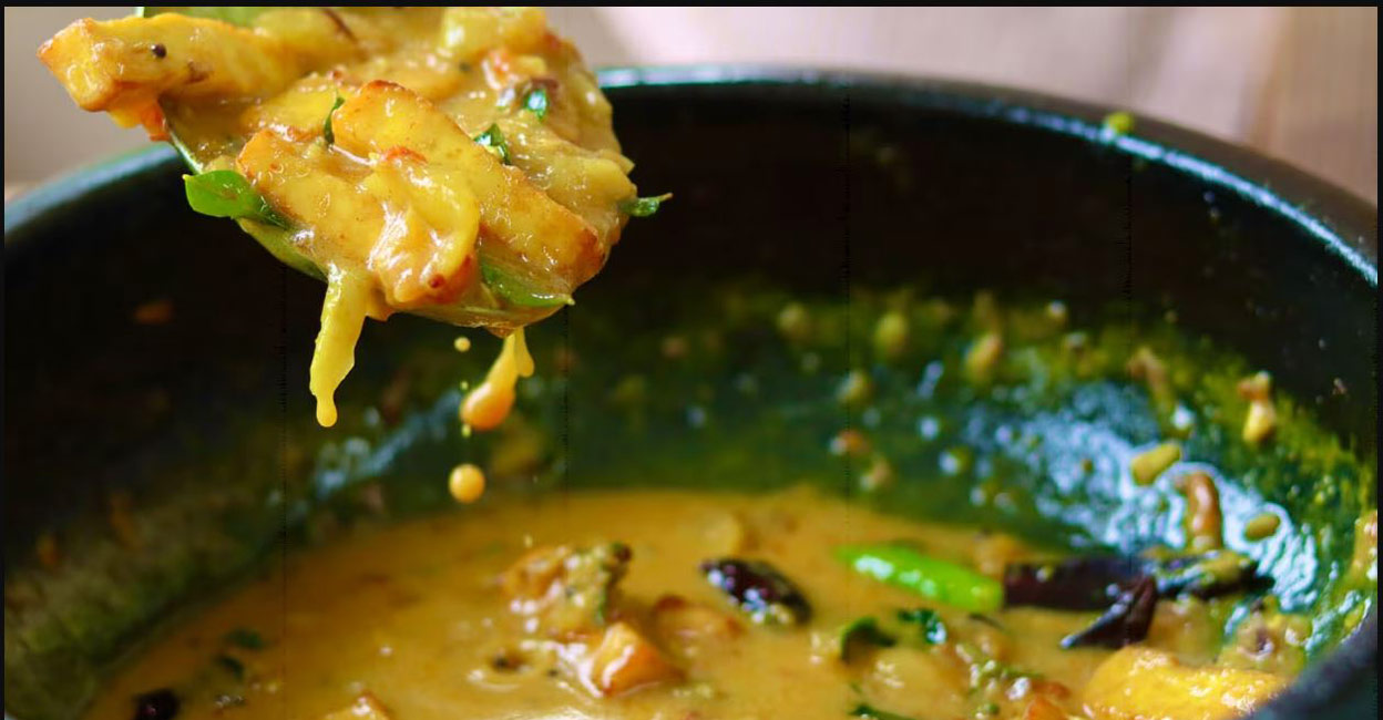 It is a yummy blend of raw mangoes, garlic, tomatoes, thick coconut milk, and more with cheese. Photo: Chef Arun Vijayan