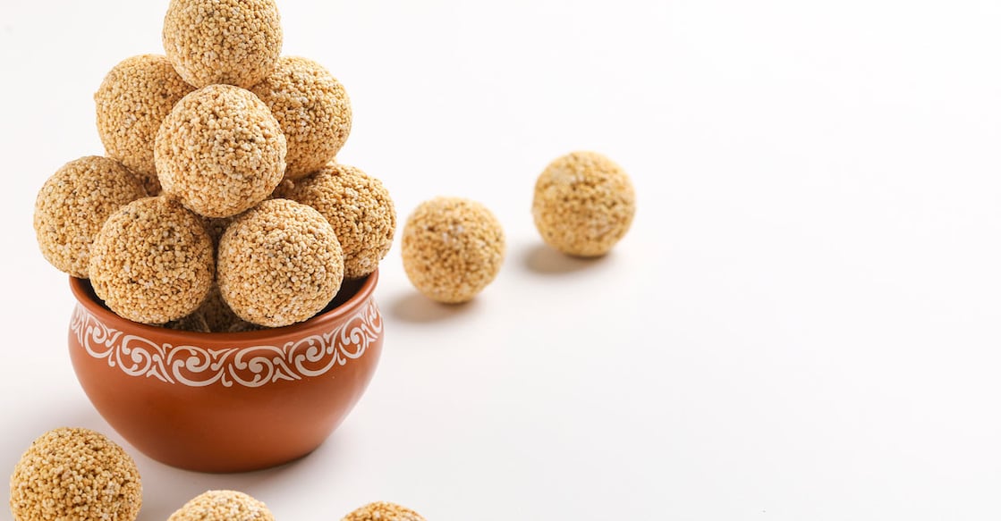 Many believe that white sesame laddoos have a warming effect on our bodies during winter and sharing them with loved ones brings good luck. iStock/Nikhil Patil