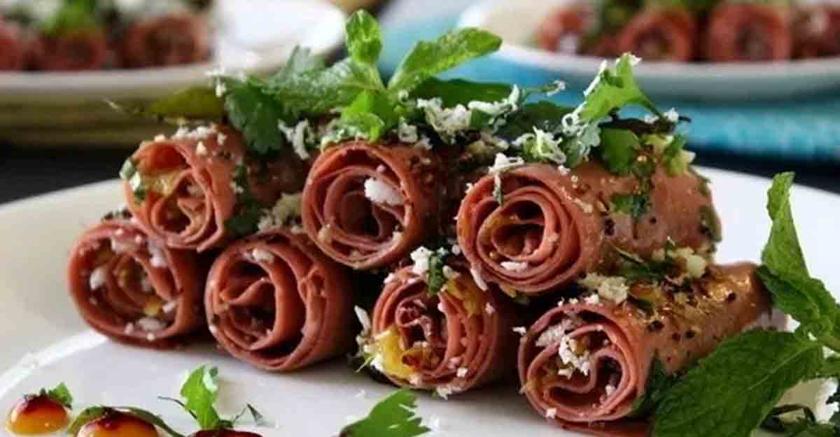 Cranberry khandvi with homemade cheese stuffing