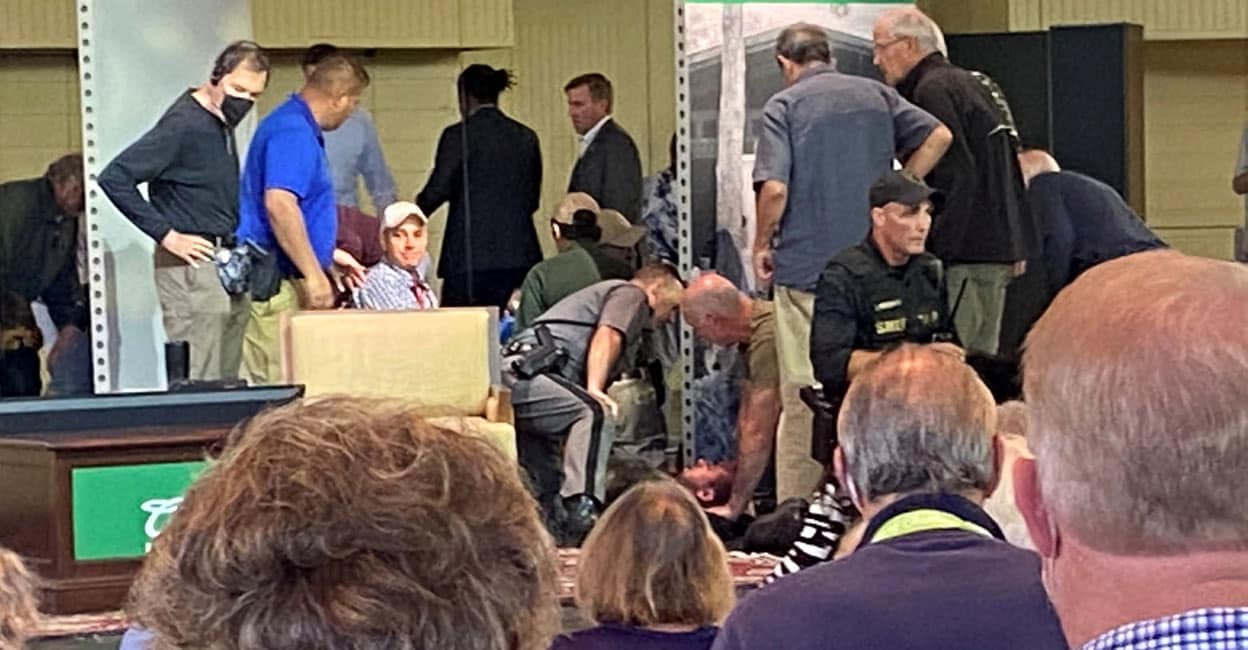 Author Salman Rushdie is treated by emergency personnel after he was stabbed on stage. Picture obtained from social media via Reuters Author Salman Rushdie is treated by emergency personnel after he was stabbed on stage. Picture obtained from social media via Reuters