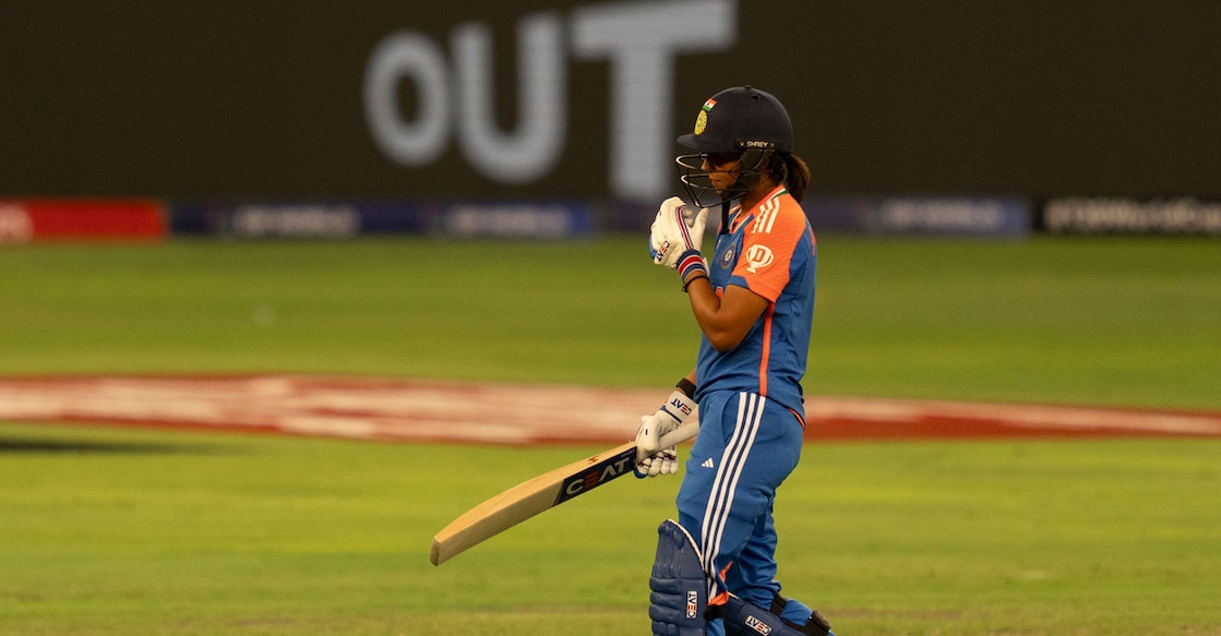 India's captain Harmanpreet Kaur walks back after being dismissed by New Zealand's Rosemary Mair during the ICC Women's T20 World Cup 2024 match in Dubai on Friday. Photo: AP via PTI