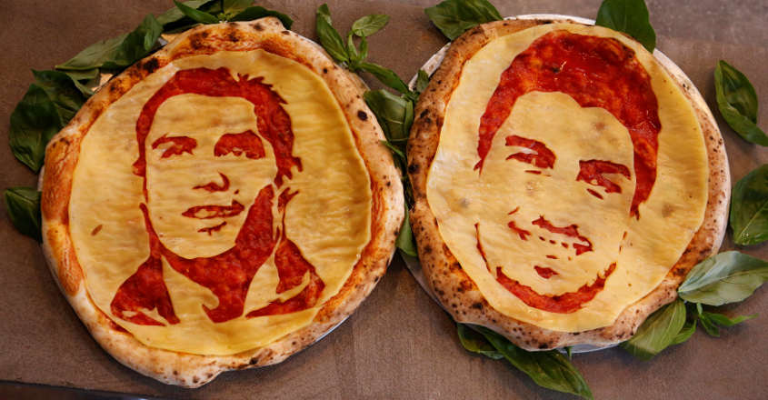 St Petersburg pizza art gives fans a shot at biting Suarez