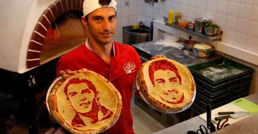 St Petersburg pizza art gives fans a shot at biting Suarez