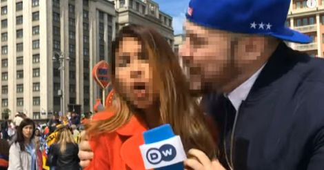 Russian gropes, kisses woman World Cup reporter on air