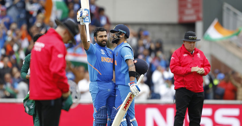 Manchester: India's Rohit Sharma celebrates his century during the 22nd match of 2019 World Cup between India and Pakistan at Old Trafford in Manchester, England on June 16, 2019. (Photo: Surjeet Yadav/IANS)