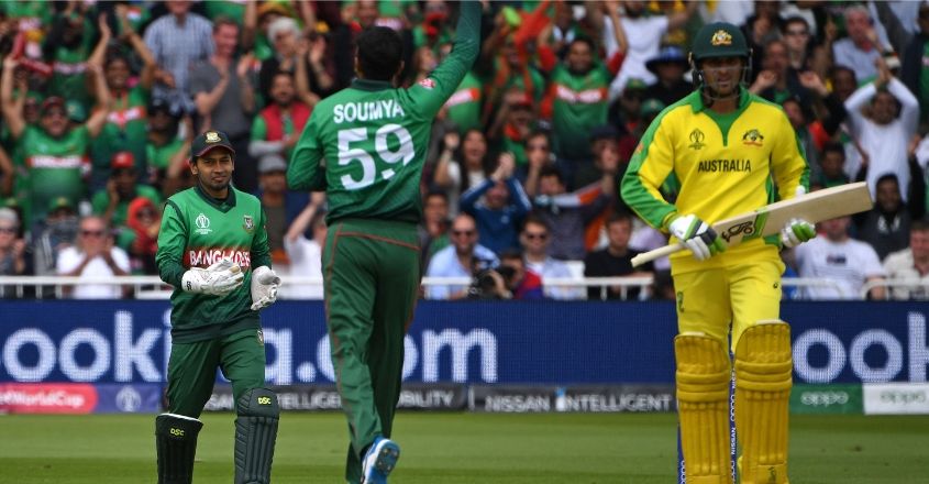 Mushfiqur Rahim (L) and Soumya Sarkar (C) celebrate 