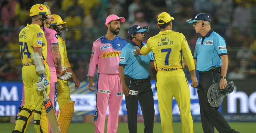Dhoni fined 50% match fee for confronting umpires