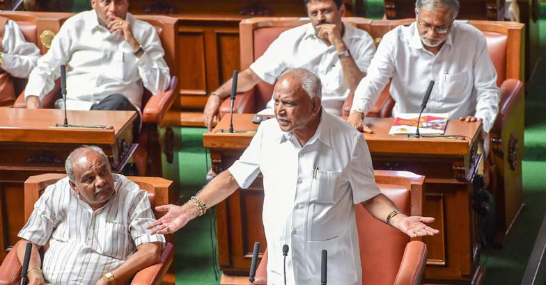 Column | Yediyurappa treads cautiously on emotive Karnataka flag demand Column | Yediyurappa treads cautiously on emotive Karnataka flag demand