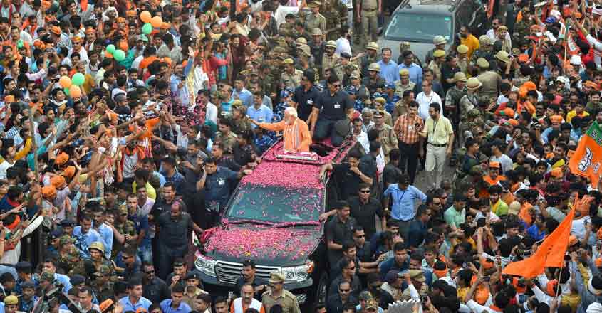 PM Modi holds mega roadshow in Varanasi, performs Ganga aarti