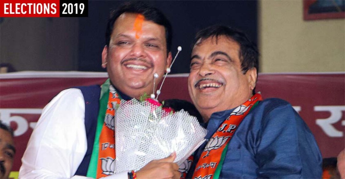 fadnavis-gadkari Maharashtra Chief Minister Devendra Fadnavis with Union Minister and BJP candidate Nitin Gadkari being garlanded at a public meeting in Nagpur. PTI