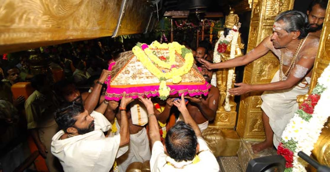 Thiruvabharanam handed over to the Sabarimala temple priest. Photo: Manorama