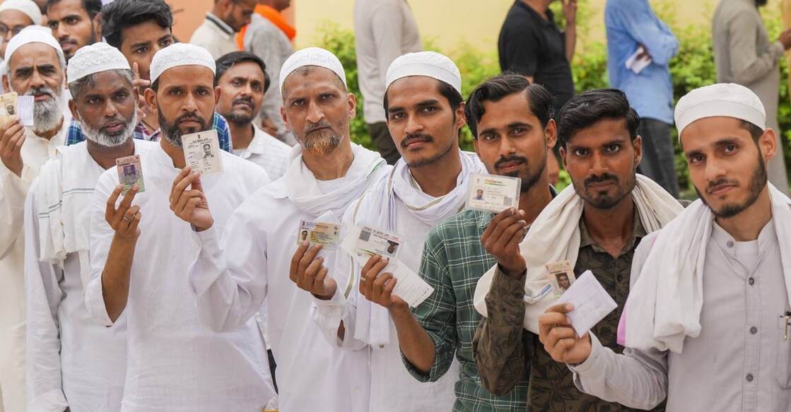 Voters wait in a queue at a polling booth to cast votes during the seventh and last phase of Lok Sabha elections, in Varanasi, Saturday, June 1, 2024. Voters wait in a queue at a polling booth to cast votes during the seventh and last phase of Lok Sabha elections, in Varanasi, Saturday, June 1, 2024. Photo: PTI.