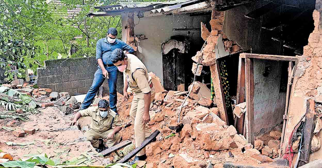 A 25ft tall, 30 feet long, 12 inch wide wall collapses over a house in Mudavanmugal, Thiruvananthapuram. Photo: Rinkuraj Mattancheril