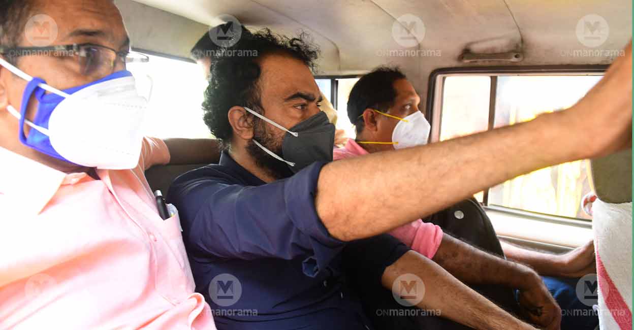 Monson Mavunkal en route to his house in Kaloor for evidence collection