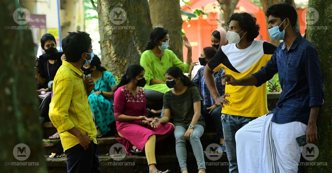Students catch up with their friends after colleges reopened in Kerala on October 4. Photo: Manorama