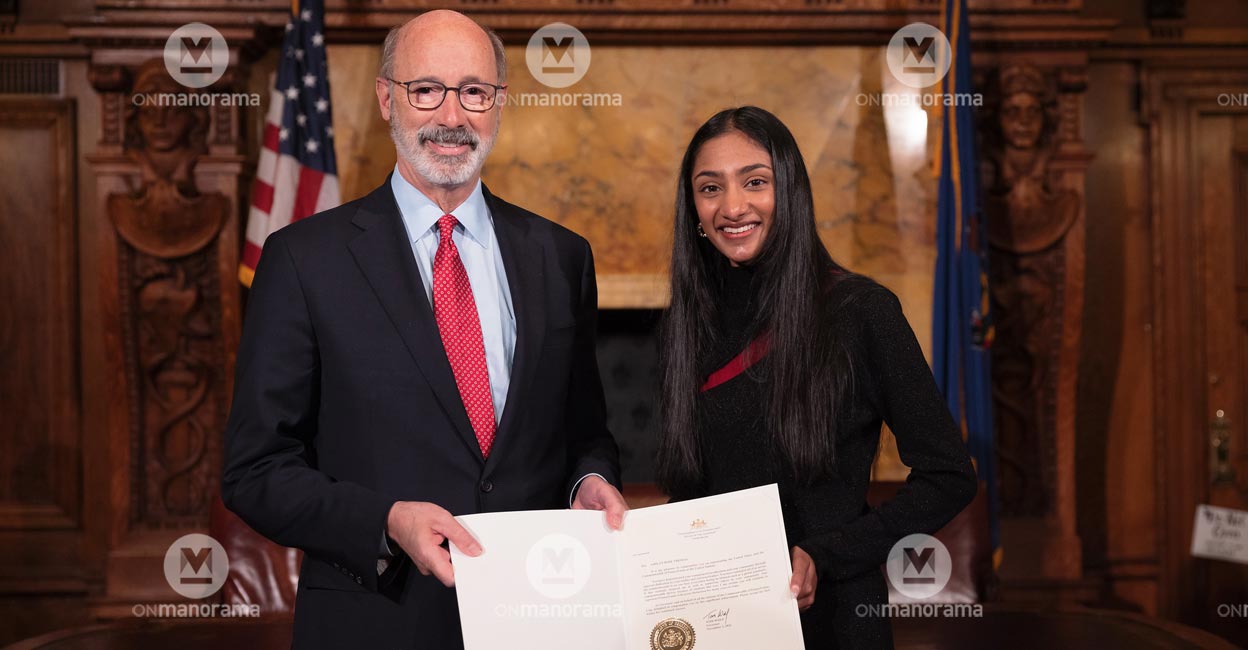 Amilyn Rose Thomas and Pennsylvania Governor Tom Wolf.