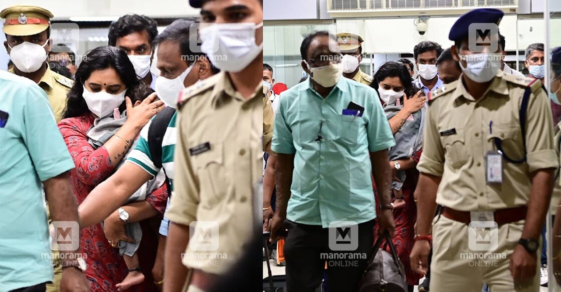 An official from  Kerala State Council for Child Welfare carries the child back to Kerala from Andhra Pradesh. Photo: Rinkuraj Mattancheril/Manorama