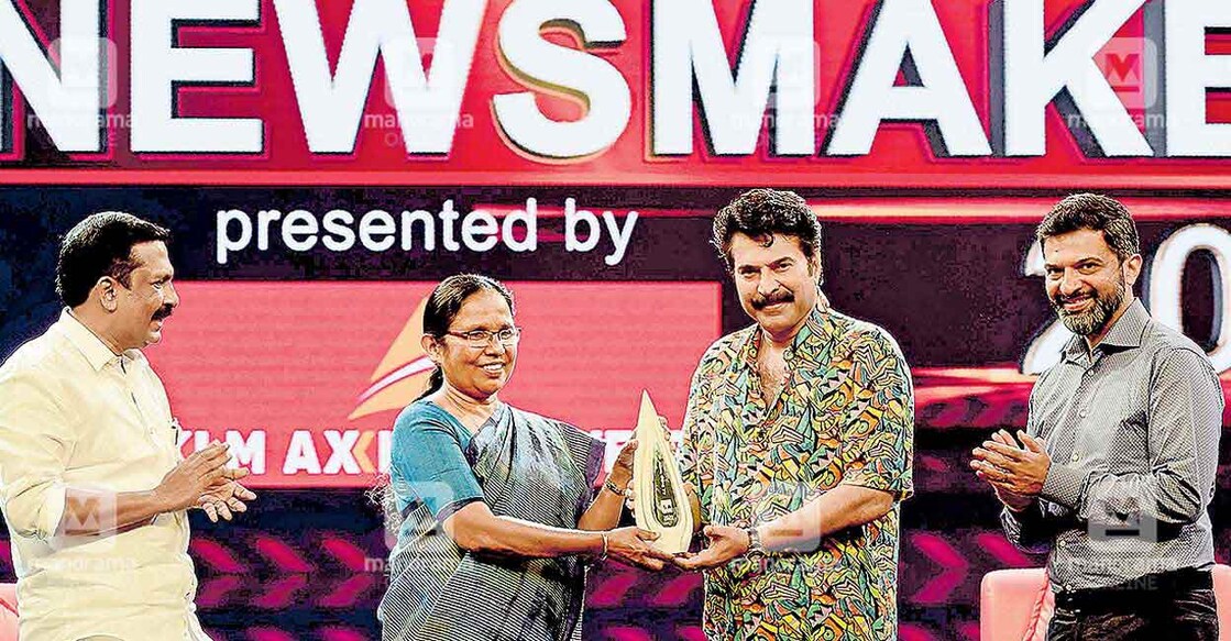 K K Shailaja receives Manorama Newsmaker Award from actor Mammootty in the presence of KLM Axiva Finvest Director Shibu Thekkumpuram and  Malayala Manorama Executive Editor Jayant Mammen Mathew.