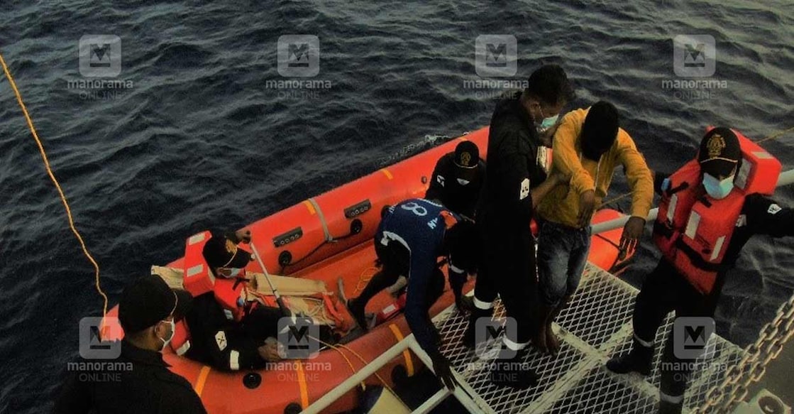 Sick Kerala fisherman rescued from boat off Lakshadweep coast after 15-day ordeal Akhil is being shifted from their fishing boat by a Coast Guard team. Photo: Manoramaonline