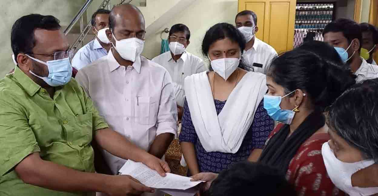 Revenue Minister K Rajan presents appointment order to Sreelekshmi, wife of late JWO A Pradeep. Photo: Facebook/ K Rajan