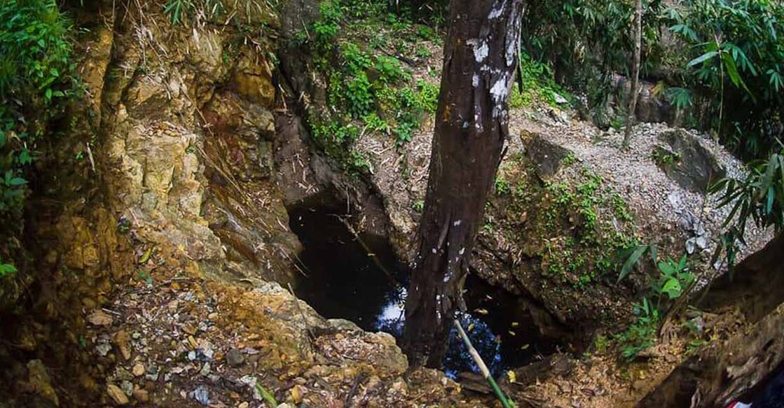 A deep trench dug by treasure hunters near Manachala, in the Palode forest range in Thiruvananthapuram district, in search of gem stones. 