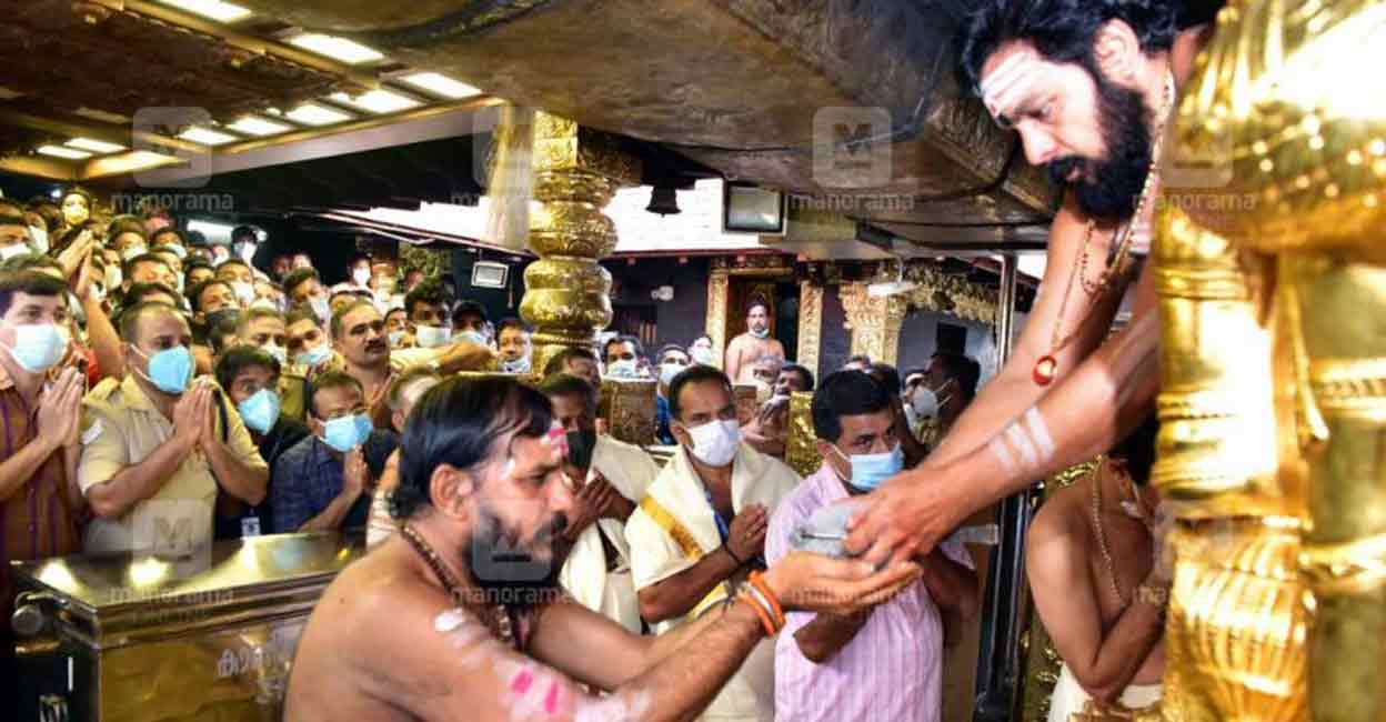 Chief Priest N Parameswaran Namboothiri performing rituals at Sabarimala Temple on Thursday evening. 