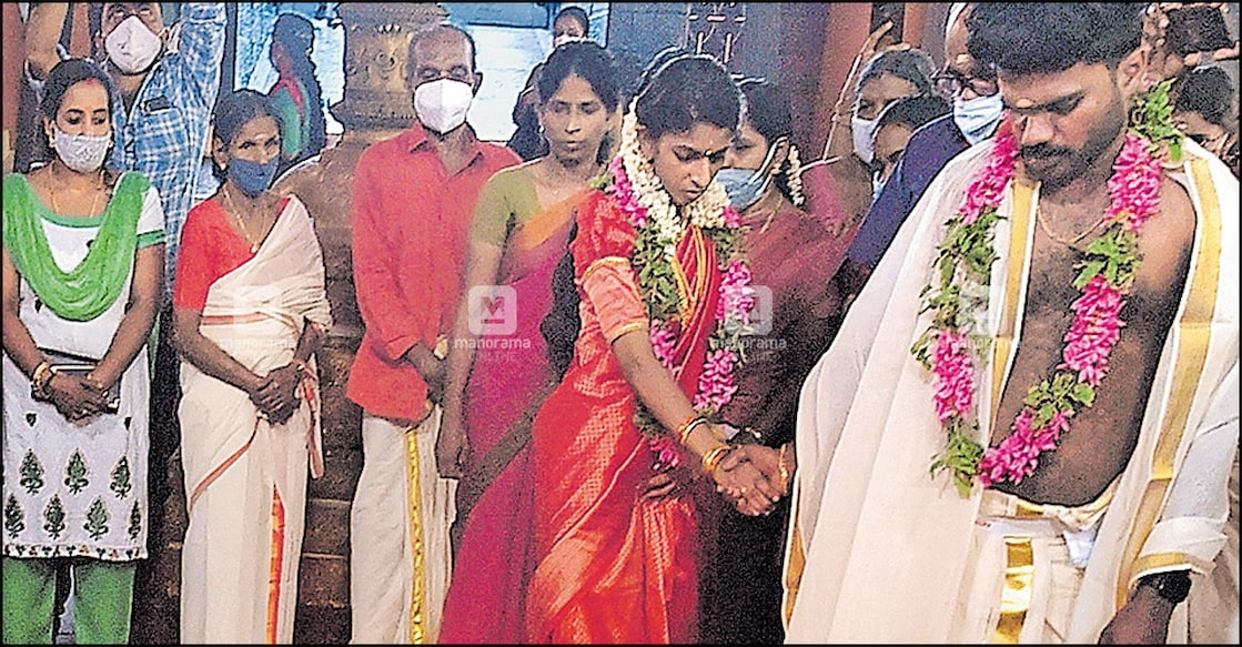 Vidya and Nithin during their wedding at Kunduvara, Thrissur