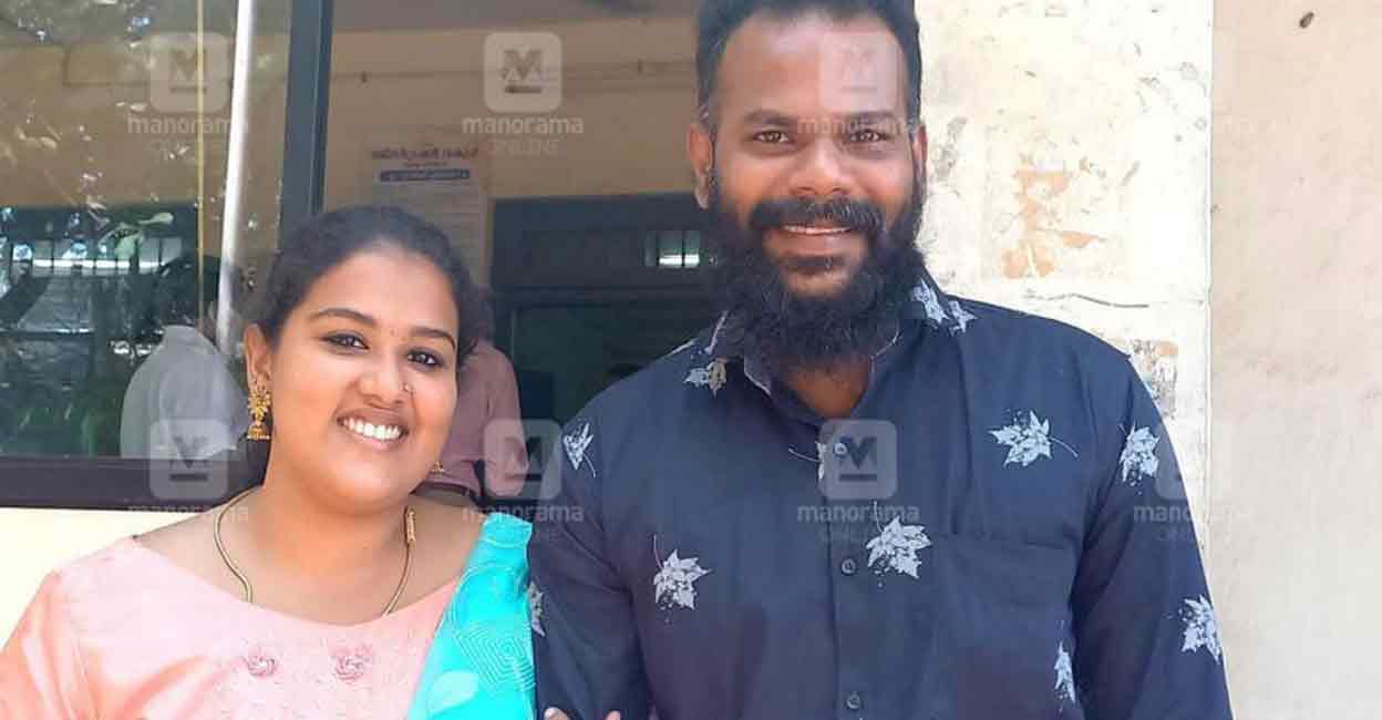 Anupama S Chandran and Ajith pose after registering their marriage at Pattom in Thiruvananthapuram on Friday. Photo: Manorama