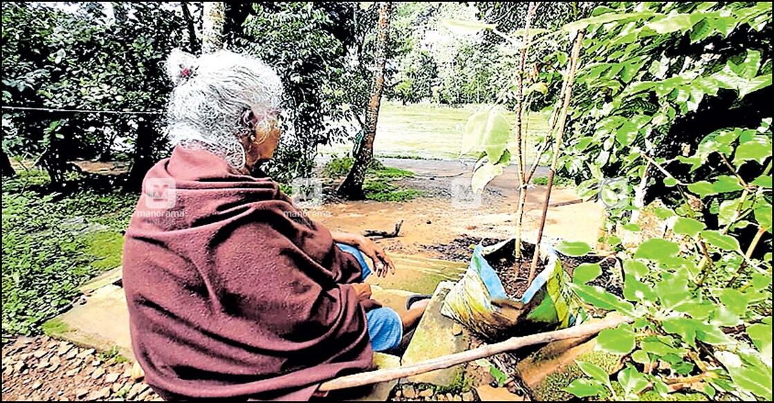 Gomathiyamma sits at the banks of Periyar river. Photo:  Manorama