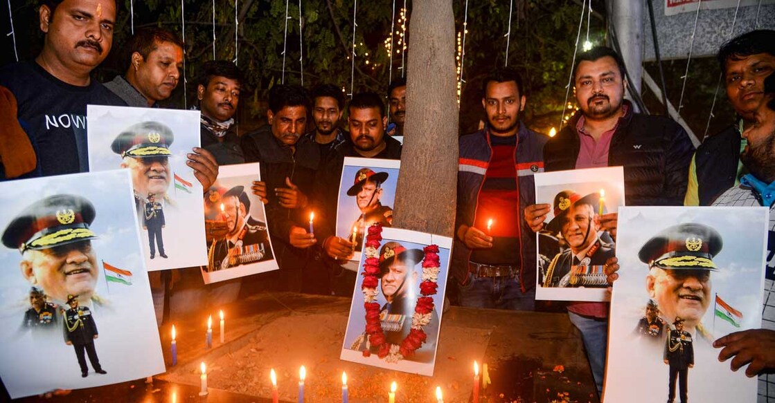 Kerala owes Gen Bipin Rawat for prompt despatch of Army personnel for rescue ops during 2018 floods People pay homage to those killed in an IAF chopper crash in Varanasi on Wednesday, Dec. 8, 2021. PTI