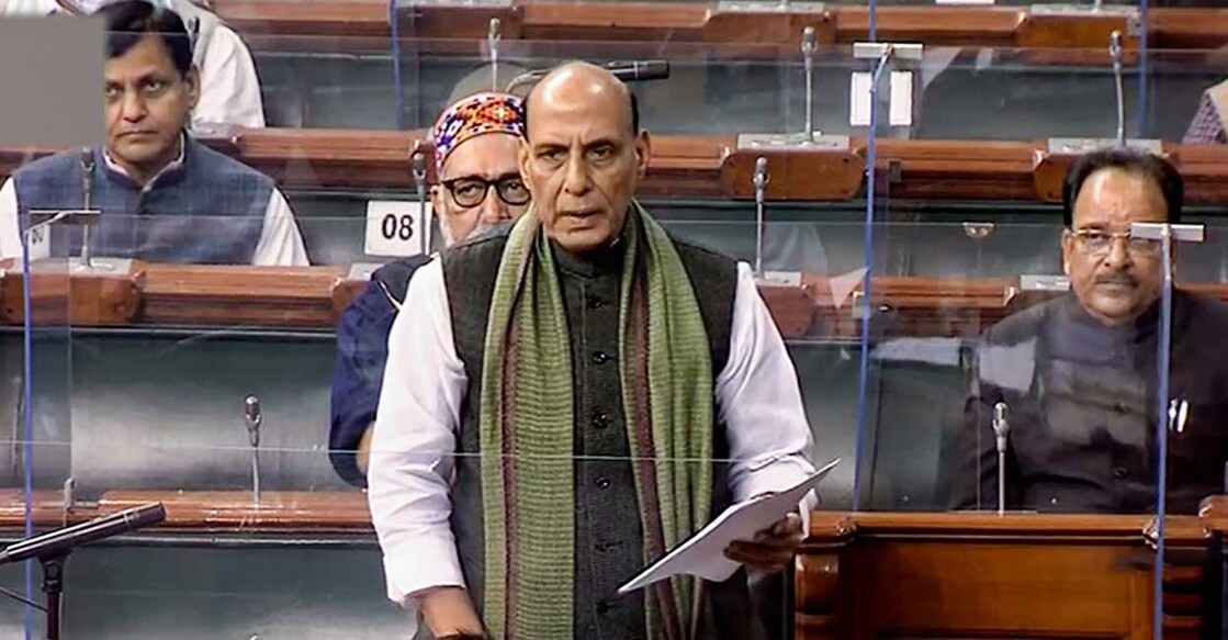 Defence Minister Rajnath Singh briefs the parliament on the IAF chopper crash in Tamil Nadu, in which 13 of the 14 people on board including CDS Gen Staff Bipin Rawat and his wife were killed, in the Lok Sabha during the Winter Session, in New Delhi, Thursday, Dec. 9, 2021. 