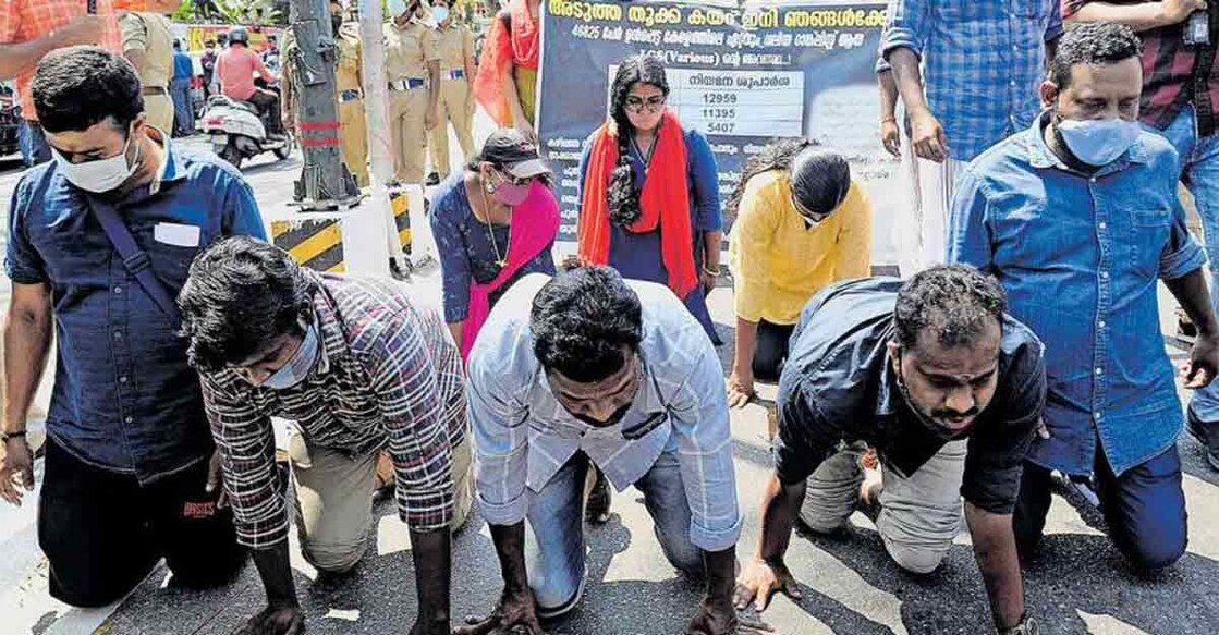  Youths staging the protests move on their knees