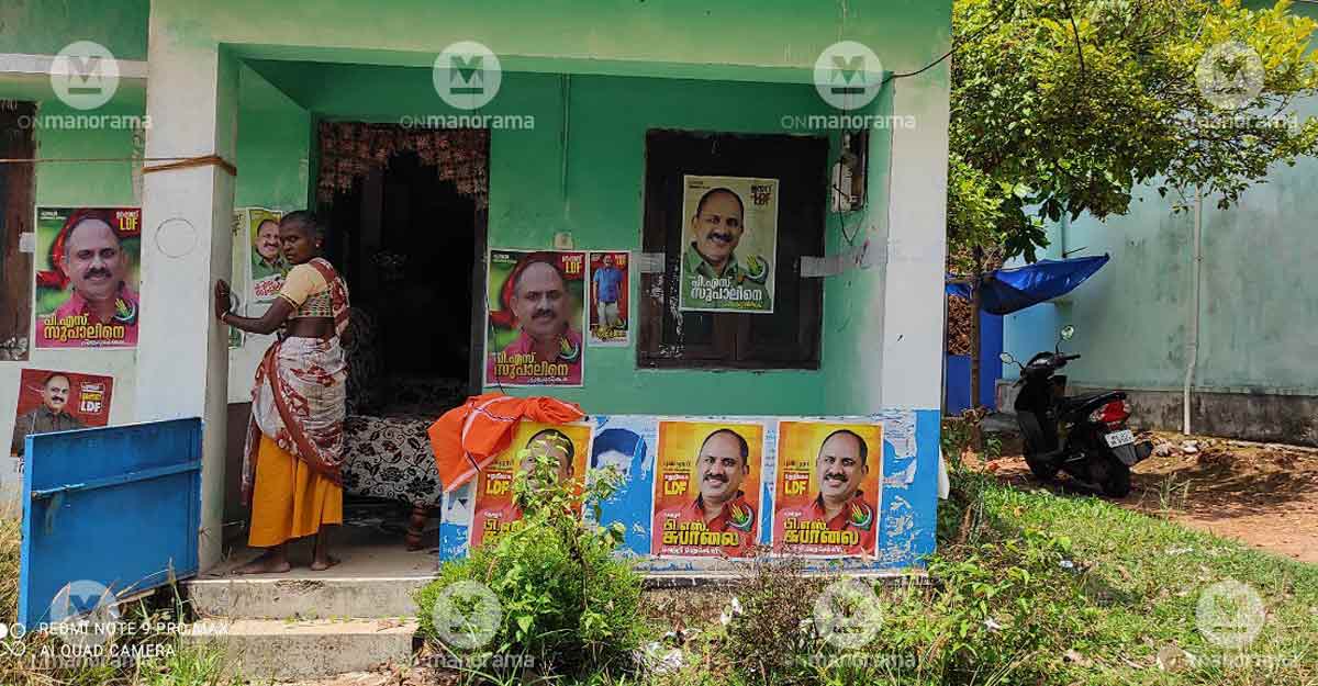An estate cottage plastered with CPI candidate P S Supal's posters. 