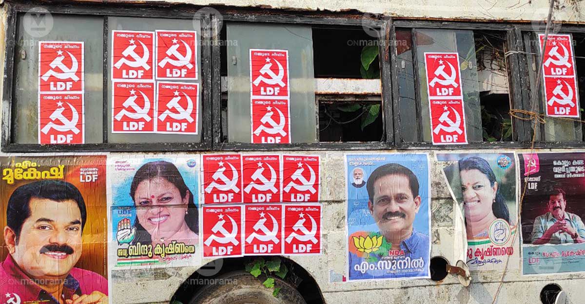 Posters of Kollam candidates on a condemned vehicle at Kacherippady area in Kollam. Photo: Onmanorama